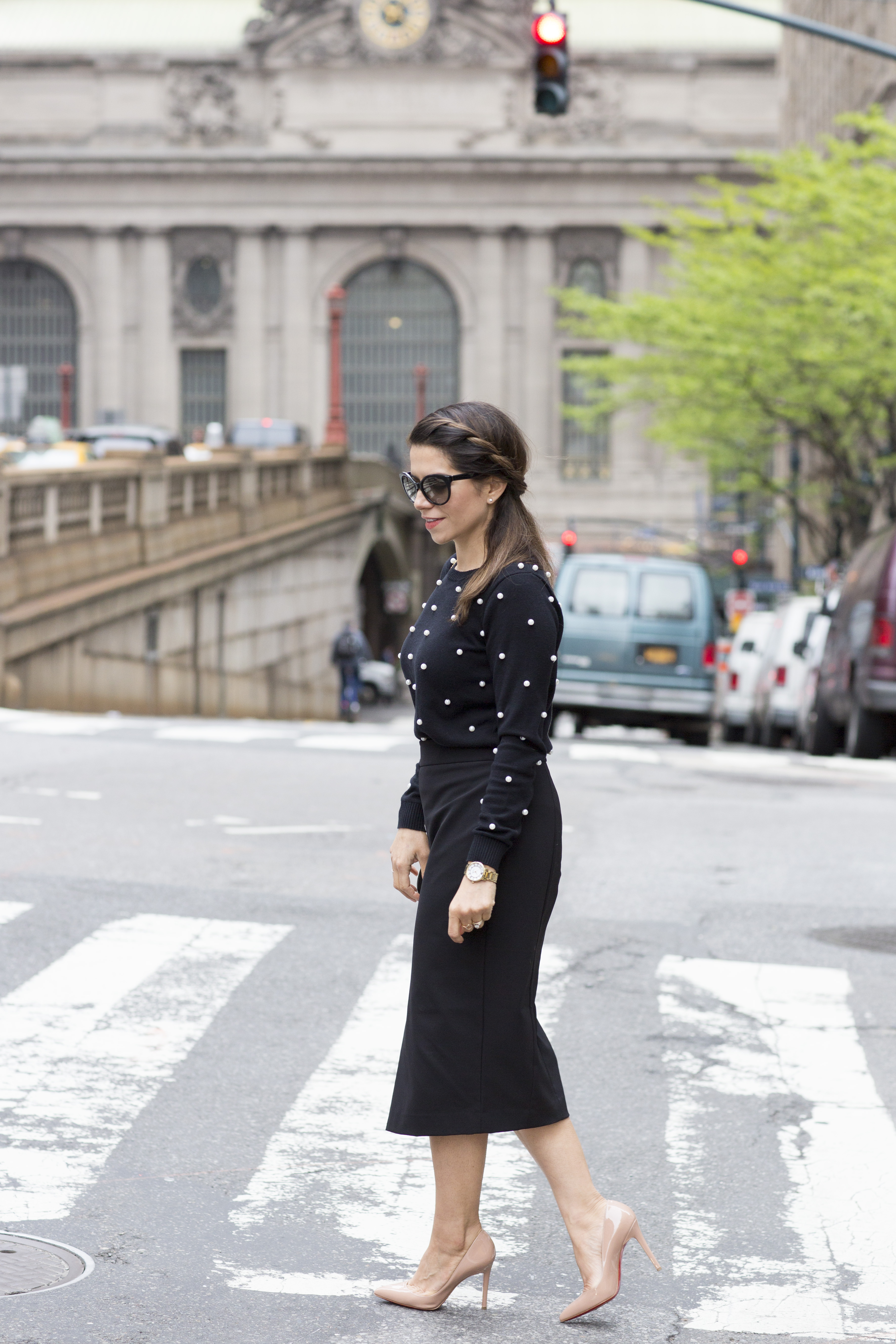 polka dot sweater with black midi skirt wearing in the spring by corporate catwalk