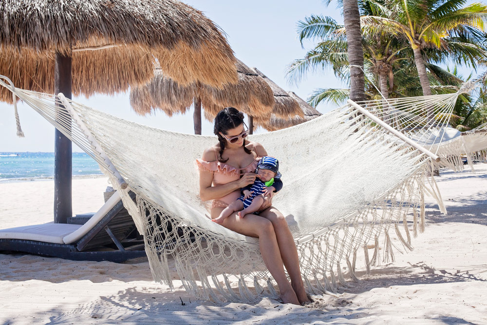 How to Travel with a baby Beach Mexico Tulum Playa del Carmen Tropical Polka Dot swimsuit traveling with infant summer photo