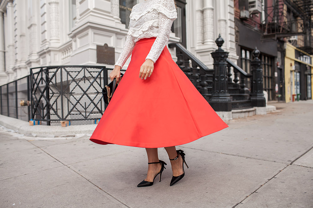 Red H&M skirt and black SJP bow heels Sezane ninon blouse